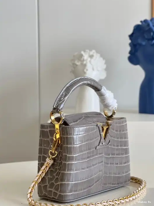 VUITTON LOUIS MINI CAPUCINES 0315