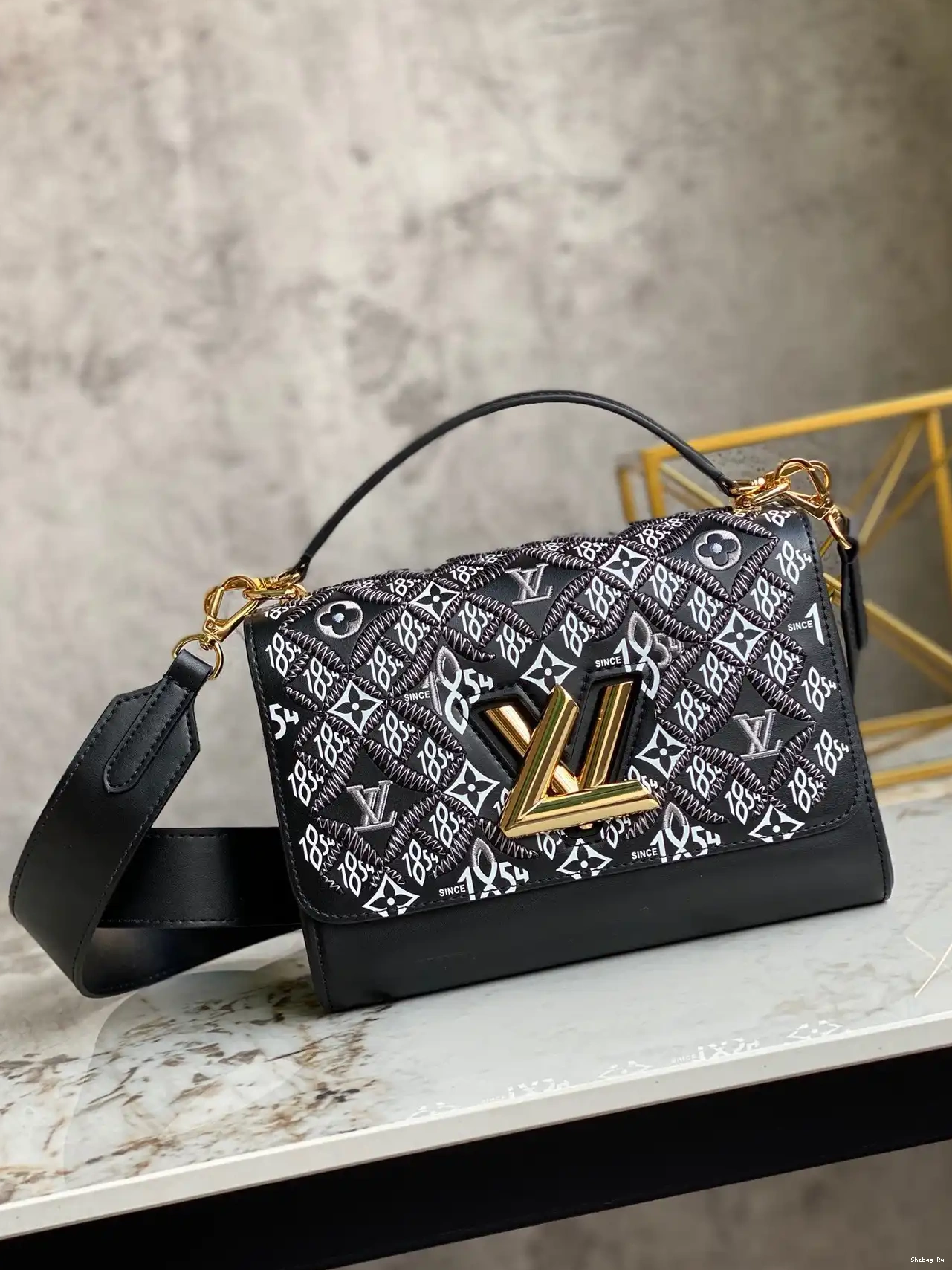 VUITTON 1854 SINCE TWIST LOUIS MM 0313